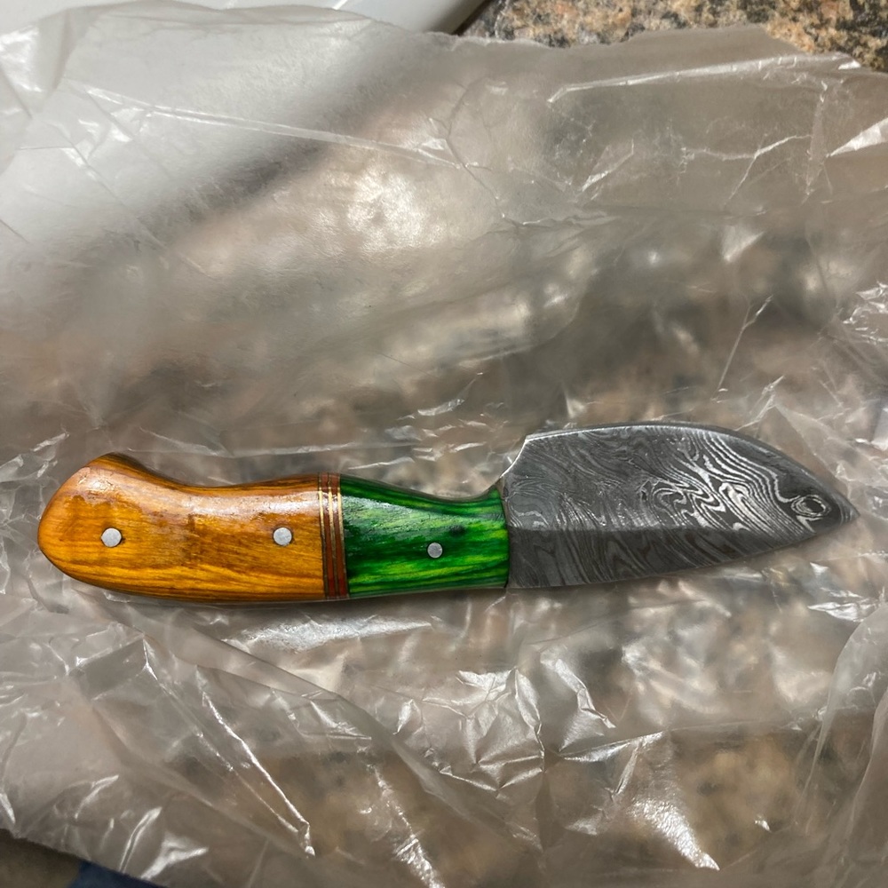 Handmade Damascus steel camping knife